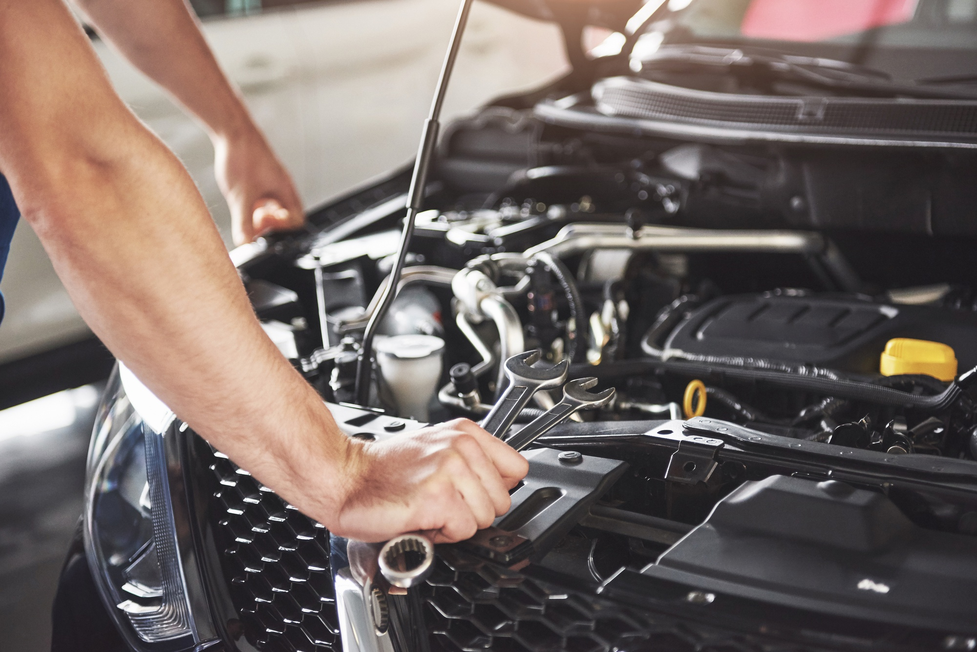 Car engine undergoing expert maintenance